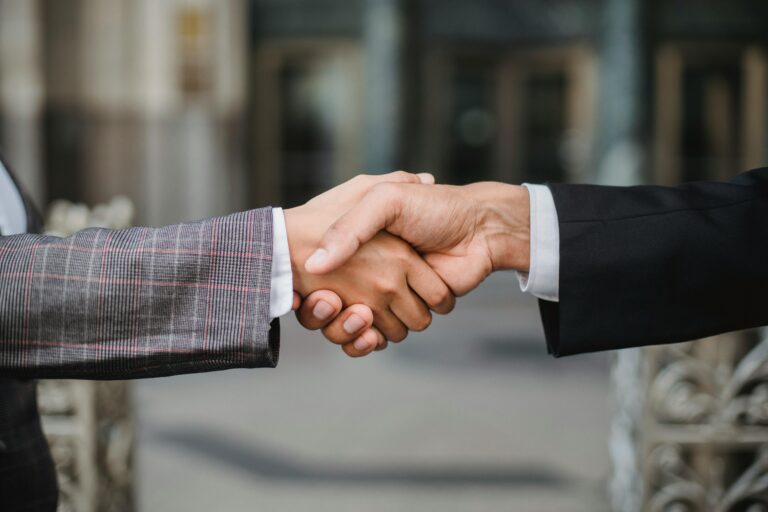 two men shaking hands